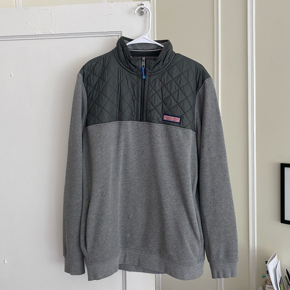 Grey Vineyard Vines quarter zip sweatshirt with a vest material along shoulders.